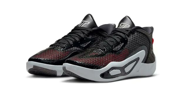 Side view of Jayson Tatum's black and grey Jordan Brand shoes.